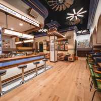 <p>The Bar Room exhibits at 1950s diner style with Mexican-inspired decor</p>