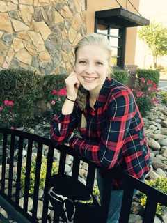 Brewster High Student Assists Elderly Woman In Reading The News