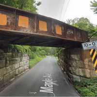 Tractor-Trailer Hits Railroad Overpass In Capital District