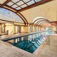 <p>60-foot underground tunnel leads to the Olympic-sized swimming pool.</p>