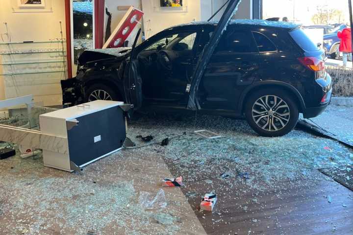 'Like An Earthquake': Video Shows Car Slamming Into Burlington Eye Care Store