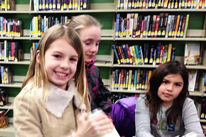 PHOTOS: Kids Made Butter In Bogota Library's Maker Lab