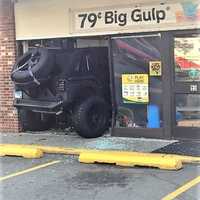 <p>The Jeep crashed through the Cliffside Park 7-Eleven&#x27;s front window.</p>