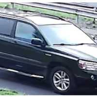 <p>Police say the suspect fled in this waiting car, which they believe to be a Toyota Highlander.</p>