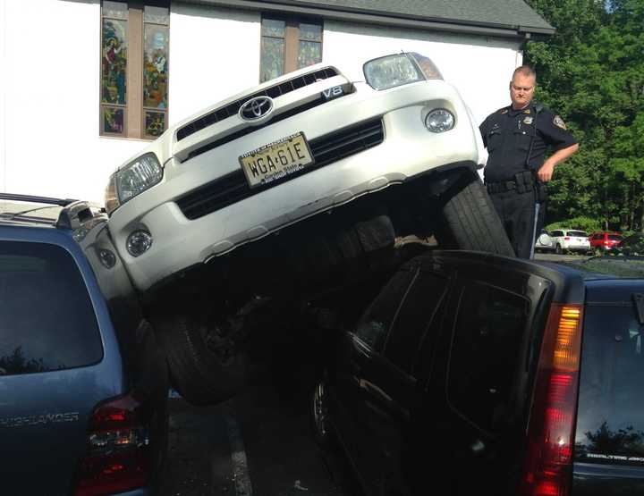 Firefighters and EMS workers assisted the driver.