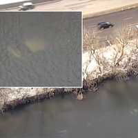 <p>The submerged car can be seen in this aerial shot.</p>