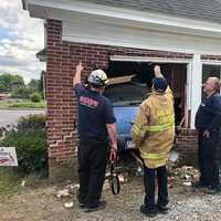 <p>The fire department&#x27;s collapse crew assessing the home a 2006 Chrysler RT Cruiser was pulled out of in the 1000 block of Columbia Avenue Lancaster, Pennsylvania.</p>