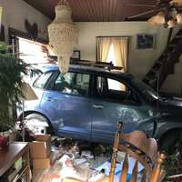 Car Slams Into Lancaster Home, Parking In Living Room (Photos)