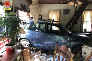 Car Slams Into Lancaster Home, Parking In Living Room (Photos)