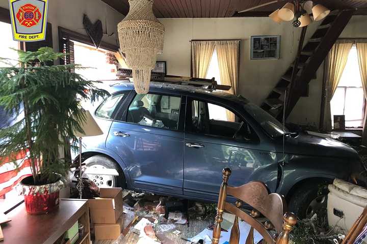 Car Slams Into Lancaster Home, Parking In Living Room (Photos)