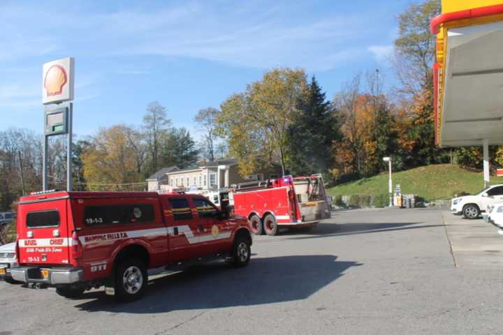 Mahopac Falls Fire and Carmel Police converge on a car fire at Red Mills Shell station