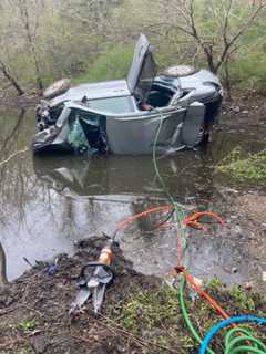 Driver Rescued After Car Crashes Into Trees, Sump Off Long Island Expressway