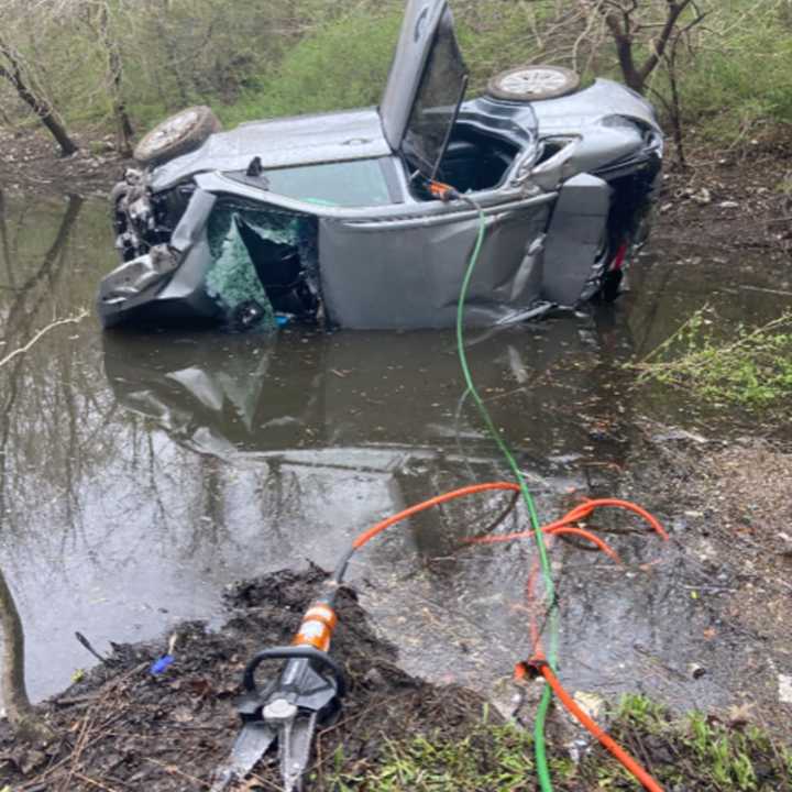 A 52-year-old Long Island man suffered fractures to both legs and hypothermia after crashing into a pond.