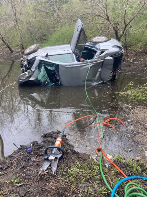 Driver Rescued After Car Crashes Into Trees, Sump Off Long Island Expressway