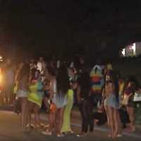 <p>The crowd boarding shuttle buses leaving the Alpine backyard pool party.</p>