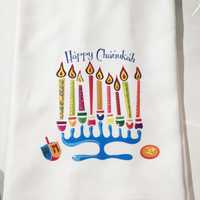 <p>Chanukah dish towel at Presence.</p>