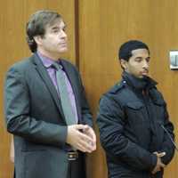 <p>Defense attorney Ron Bar-Nadav with Daniel Chaupiz</p>