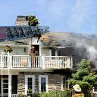 <p>Part of the roof of the Lynn Drive home collapsed during Saturday&#x27;s fire in Clifton.</p>