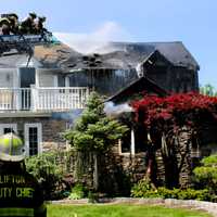 <p>Firefighters went defensive once the roof of the Lynn Drive home in Clifton began collapsing on Saturday, May 27.</p>