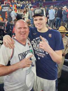 Star Donovan Clingan's Dad, An Eversource Worker By Day, Watches UConn Defend National Title