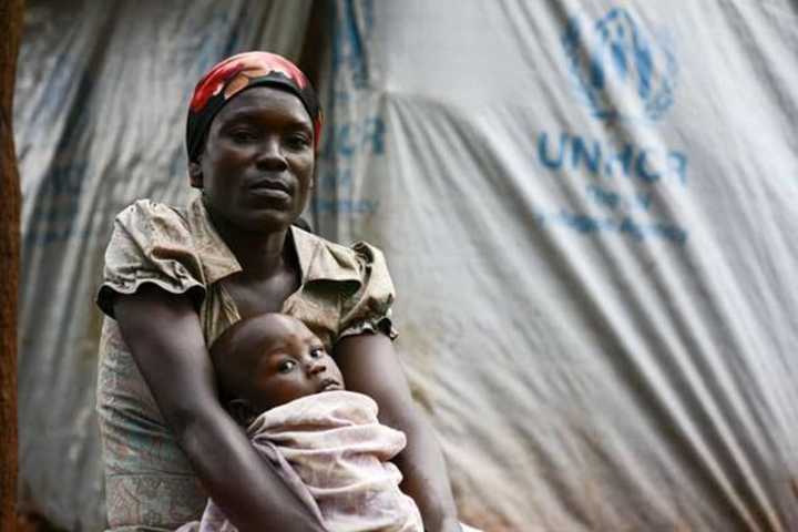 Congolese mother and son at one of the Tanzanian refugee camps. The Newtown Interfaith Partnership for Refugee Resettlement helped to bring a family of six from there to Connecticut in November.