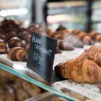 <p>The cafe serves fresh croissants.</p>