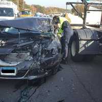 <p>A Nissan Maxima traveling in the left lane of I-95 struck the rear of a DOT &#x27;crash truck&#x27; in a construction zone in Milford on late Wednesday morning.</p>