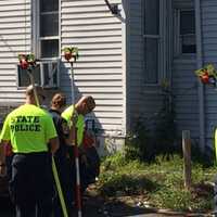 <p>State police investigators at work at the scene of a fatal crash at Railroad Avenue and Iranistan Avenue in Bridgeport on Thursday.</p>