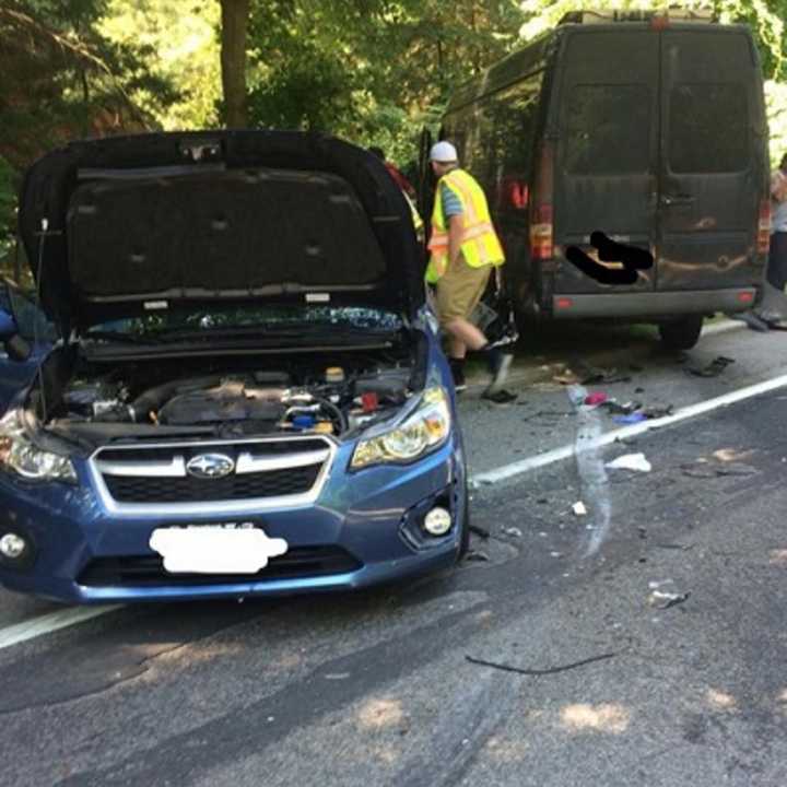 First responders examine the scene of a two-car crash on Route 129 in Cortlandt Friday.