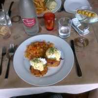 <p>A patron&#x27;s portrait of Croton Creek&#x27;s oyster Eggs Benedict shortly before he devoured and washed it down with a dirty martini.</p>