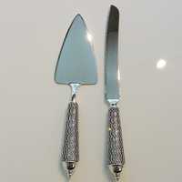 <p>Cyrstal cake servers at Presence in Piermont.</p>