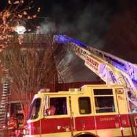 <p>The Danbury Fire Department knocks down a blaze in a building at 276 Main St. on Christmas night. </p>