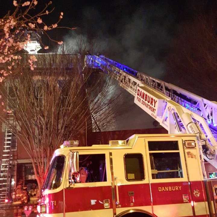 The Danbury Fire Department knocks down a blaze in a building at 276 Main St. on Christmas night. 