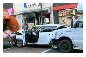 SUV Gets Sandwiched Between Dump Truck, Jitney Bus On Bergenline