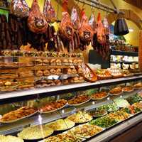 <p>Prepared foods in a display case at the deli inside Uncle Giuseppe&#x27;s Marketplace</p>