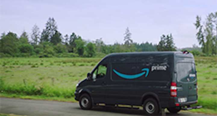 A Connecitcut woman was hit by an Amazon delivery van in her driveway.