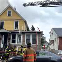 <p>Firefighters eventually pulled completely back as the towers moved into position.</p>