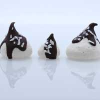 <p>Coconut milk chocolate drip drops are just one of the unique flavors at the Meringue Shop in Scarsdale.</p>