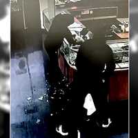 <p>Screenshot from video of burglary at Jewelry Exchange on Route 4 in Paramus on Thursday, March 23.</p>