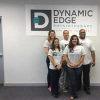 <p>Sam Hopkins, back row, right, and Patrick Buckley, back row, middle, stand with their staff at Dynamic Edge PhysioTherapy in Wilton.</p>