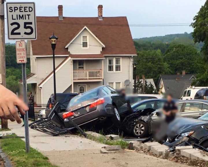 One car landed on top of another in a crash in the Plumb Library auxiliary parking lot in Shelton.