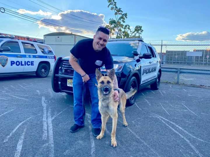 Officer Christopher Laver and new K-9 Officer Edo