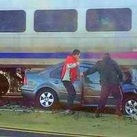 <p>All three occupants got out OK, witnesses said.</p>