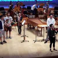 <p>Conductor Eric Jacobsen, shown here rehearsing with young musicians, will conduct the Greater Bridgeport Symphony presentation of &quot;Bernstein at 99! Saturday, March 18 at The Klein.</p>