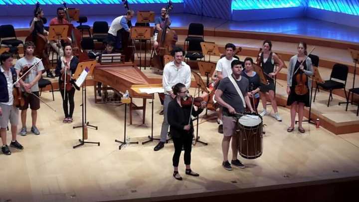 Conductor Eric Jacobsen, shown here rehearsing with young musicians, will conduct the Greater Bridgeport Symphony presentation of &quot;Bernstein at 99! Saturday, March 18 at The Klein.