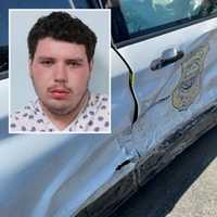 <p>Daniel Walker and one of the patrol cars that Springfield police said he crashed into on Tuesday, Sept. 28.</p>