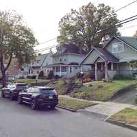 <p>The murders occurred at the house on the right. Fairmount School is on the left.</p>