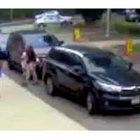 WATCH: Park Ridge Special Officer Snatches Child Before She's Pinned By Moving Car (Video)