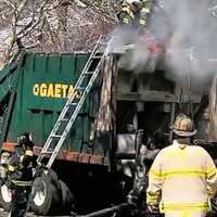 <p>Wayne firefighters douse garbage truck fire on Robin Hood Way near Longell Avenue on April 10, 2023.</p>