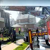 <p>Outdoor temperatures hit 92 degrees, forcing firefighters to rotate in quick shifts.</p>